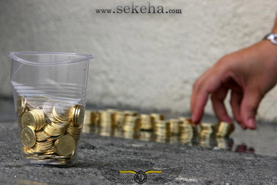 سنگفرش خیابان با سکه 25 سنتی سنگفرش خیابان با سکه 25 سنتی